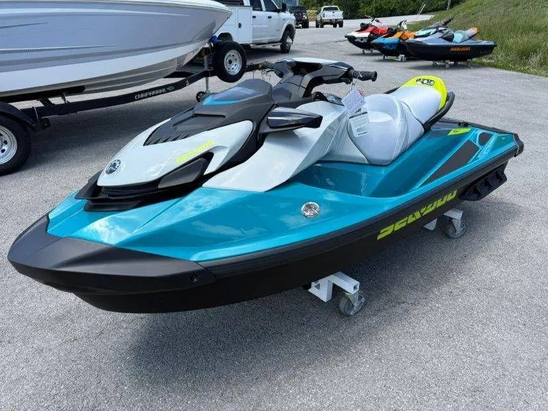 Slide: The Image of 2026 Sea-Doo GTI SE 130 jet ski on parking lot. - 21