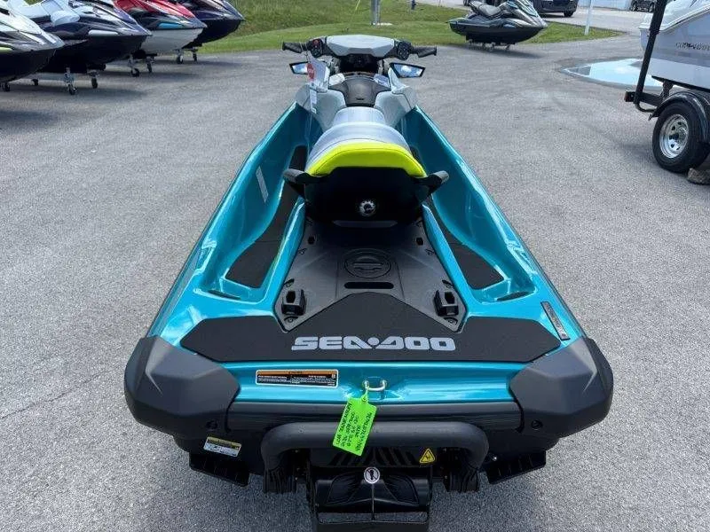Slide: The Image of 2026 Sea-Doo GTI SE 130 in vibrant blue on parking lot. - 22