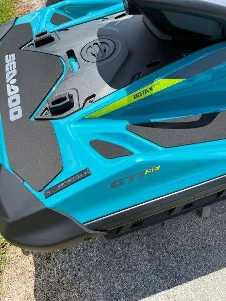 Slide: The Image of 2026 Sea-Doo GTI SE 130 in vibrant blue with Rotax engine. - 23