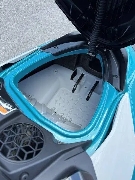 Slide: The Image of Open storage compartment of 2026 Sea-Doo GTI SE 130 jet ski. - 24