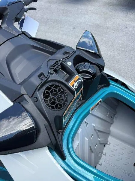 Slide: The Image of 2026 Sea-Doo GTI SE 130 jet ski with open storage compartment. - 25