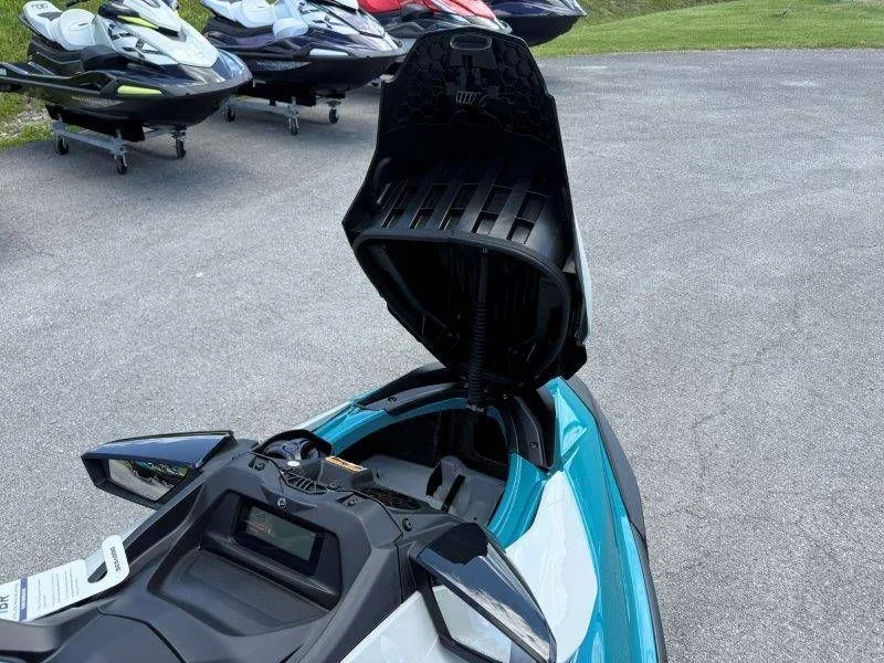 Slide: The Image of 2026 Sea-Doo GTI SE 130 with open storage compartment lid. - 26