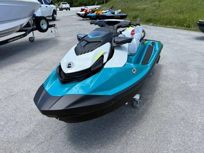 Slide: The Image of 2026 Sea-Doo GTI SE 130 jet ski in parking lot. - 30