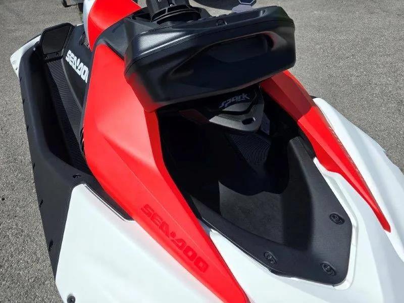 Slide: The Image of 2026 Sea-Doo Spark Trixx in red and white on asphalt. - 19