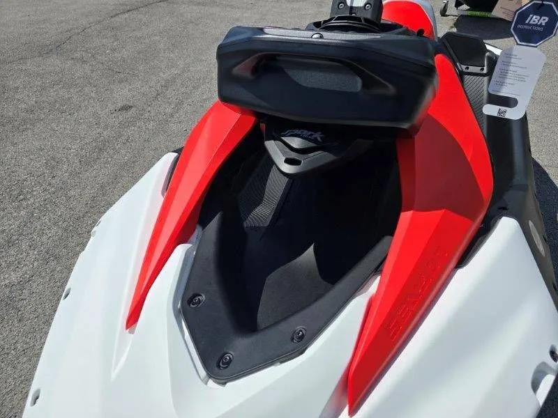 Slide: The Image of 2026 Sea-Doo Spark Trixx in red and white on asphalt. - 25