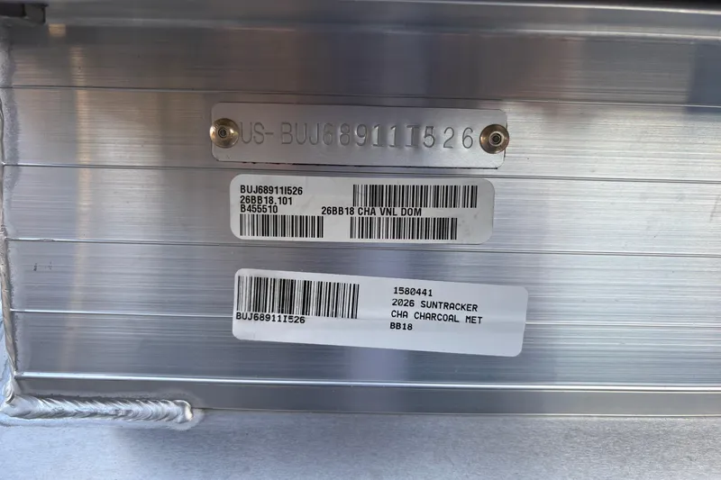 Slide: The Image of 2026 Sun Tracker Bass Buggy 18 DLX identification plate with serial numbers and labels. - 27