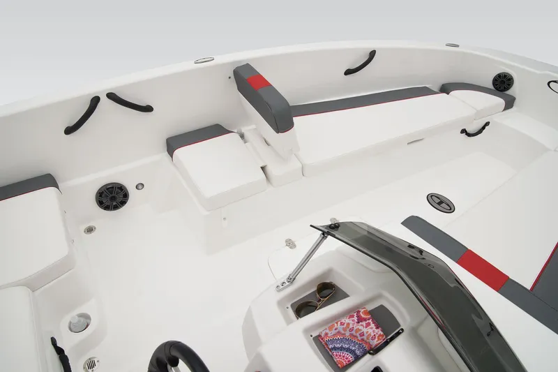 Slide: The Image of 2026 Tahoe T18 boat with safety and identification labels on red exterior. - 24