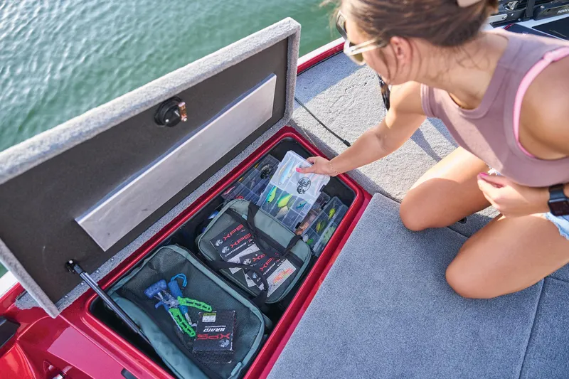 Slide: The Image of 2026 Nitro Z17 boat with Mercury Pro XS engine, parked outdoors. - 70