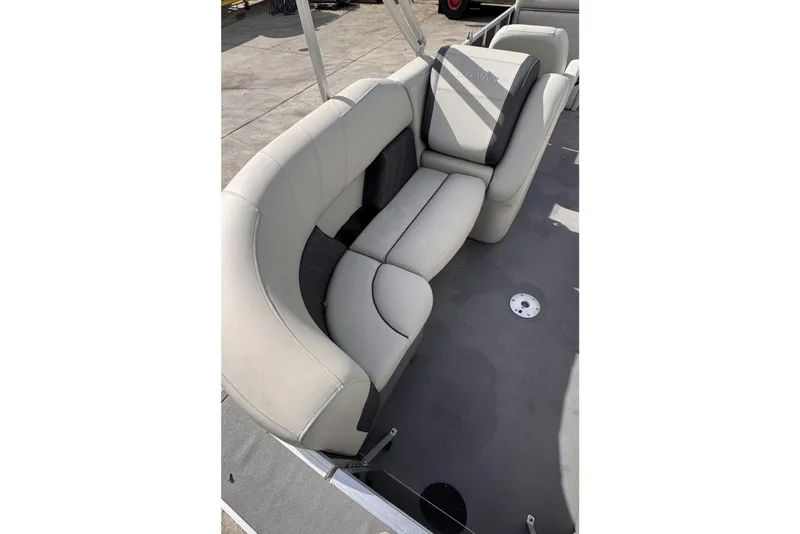 Slide: The Image of 2024 Sylvan 822 LZ boat interior with plush seating and modern design. - 12