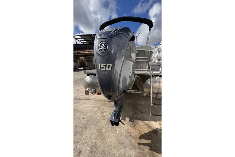 Slide: The Image of 2024 Sylvan 822 LZ pontoon boat with Yamaha 150 outboard motor. - 18