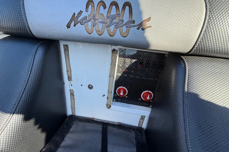 Slide: The Image of 2007 Nor-Tech Supercat 3600 interior with logo and control panel. - 24