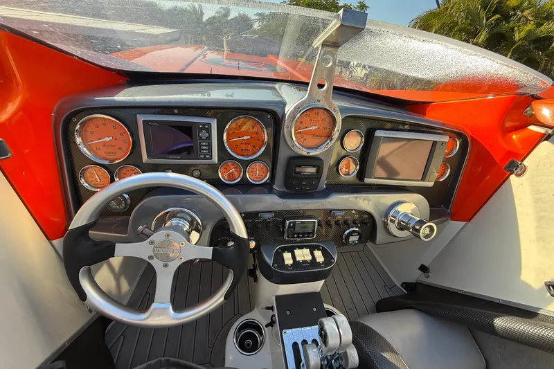 Slide: The Image of 2007 Nor-Tech Supercat 3600 dashboard with gauges, steering wheel, and navigation controls. - 41