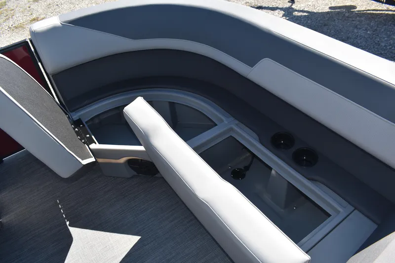 Slide: The Image of 2026 Lowe LS 190 boat interior with gray seating and storage compartments. - 18
