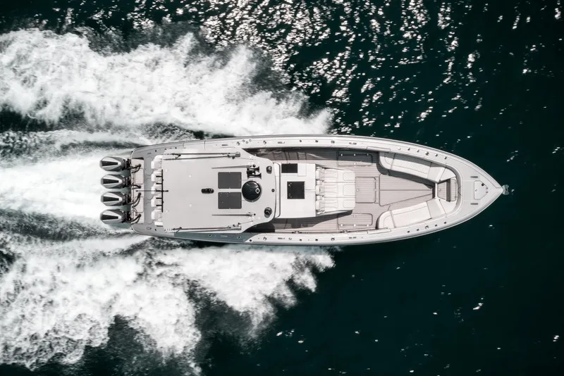 The Image of Aerial view of 2022 Midnight Express 43 Open boat cruising on water. - 0