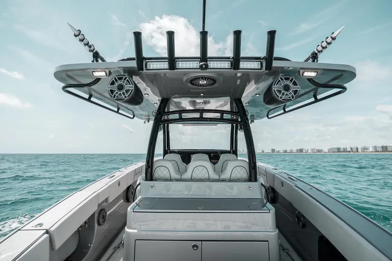 Slide: The Image of 2022 Midnight Express 43 Open boat on open water, showcasing luxury seating and modern design. - 5