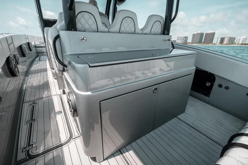 Slide: The Image of 2022 Midnight Express 43 Open yacht interior with sleek seating and modern design. - 8