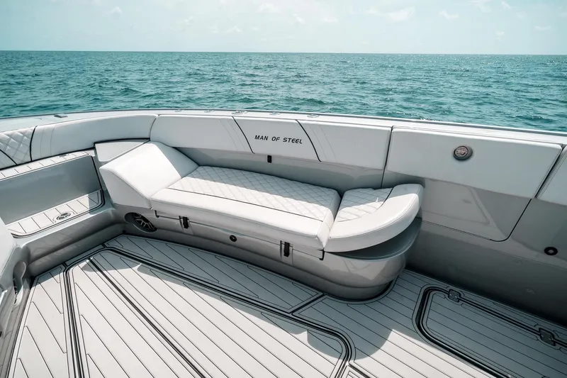 Slide: The Image of Luxurious seating on 2022 Midnight Express 43 Open boat with ocean view. - 9