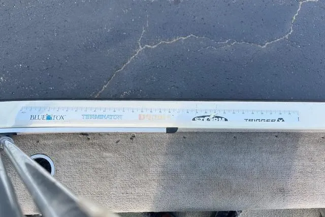 Slide: The Image of Ruler on 2012 Smoker Craft Pro Angler XL 162 boat, featuring various fishing brand logos. - 19