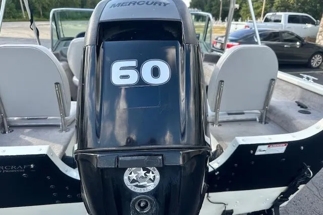 Slide: The Image of 2012 Smoker Craft Pro Angler XL 162 with Mercury 60 outboard motor, rear view. - 5