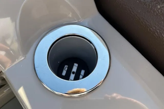 Slide: The Image of Cup holder in 2019 Premier 220 Gemini boat, featuring sleek chrome finish. - 11