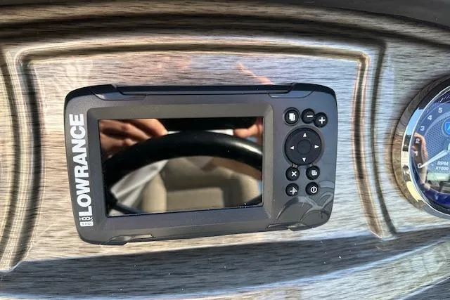 Slide: The Image of Lowrance fishfinder on 2019 Premier 220 Gemini boat dashboard. - 14