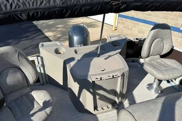 Slide: The Image of 2019 Premier 220 Gemini boat interior with seating and control panel. - 15