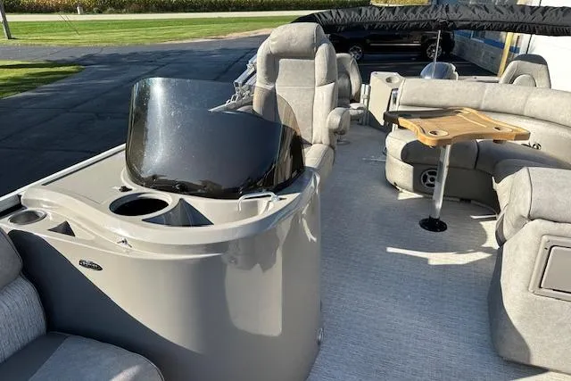 Slide: The Image of 2019 Premier 220 Gemini boat interior with seating and table, featuring modern design. - 20