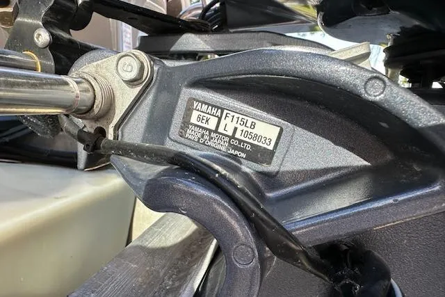 Slide: The Image of Close-up of Yamaha F115LB engine part on 2019 Premier 220 Gemini boat. - 30