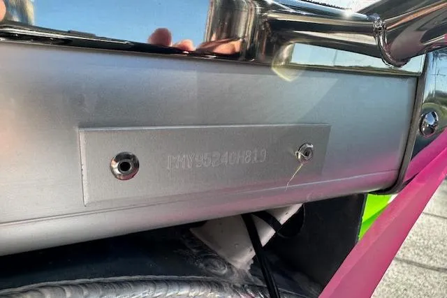 Slide: The Image of VIN plate on a 2019 Premier 220 Gemini boat, showcasing engraved identification number. - 31