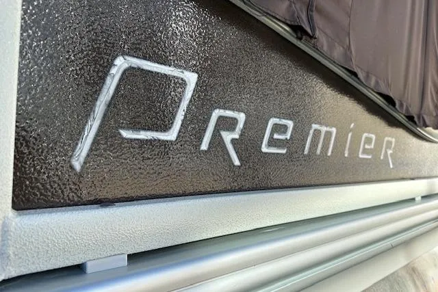 Slide: The Image of Close-up of 2019 Premier 220 Gemini logo on textured surface. - 6