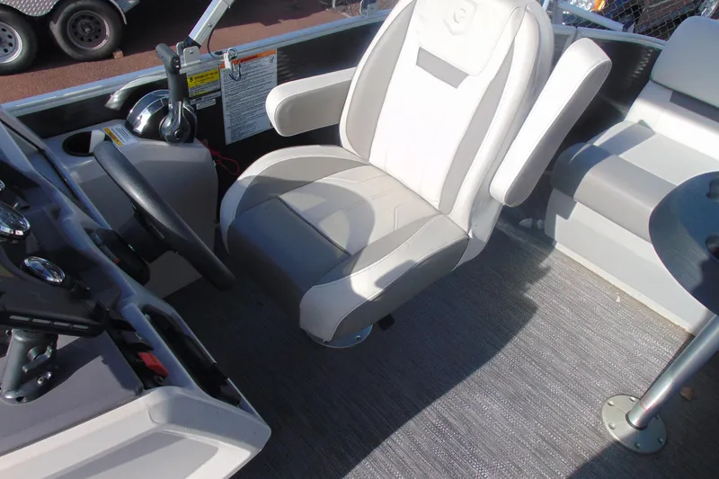 Slide: The Image of Captain's seat and controls of 2022 Godfrey Sweetwater 1680 CX pontoon boat. - 10