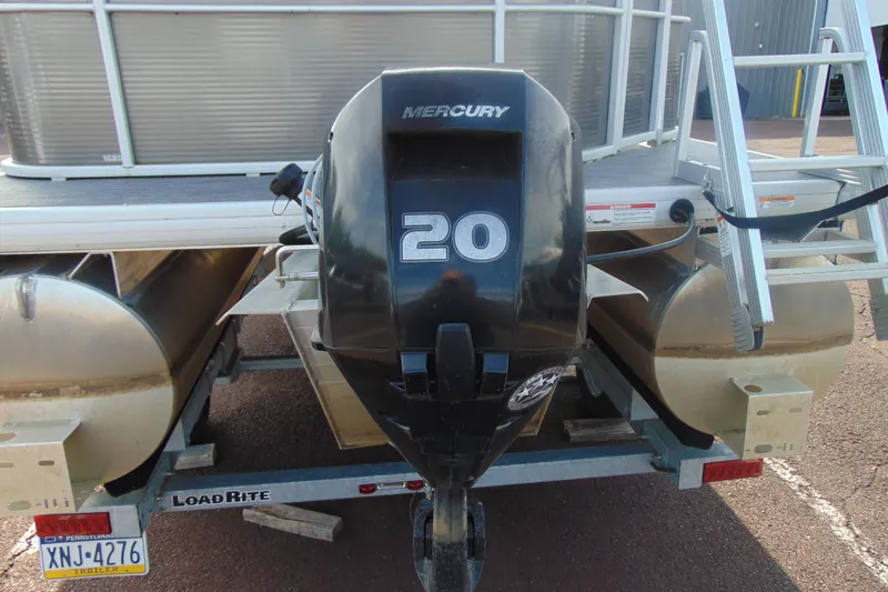 Slide: The Image of 2022 Godfrey Sweetwater 1680 CX pontoon boat with Mercury 20 HP outboard motor. - 5