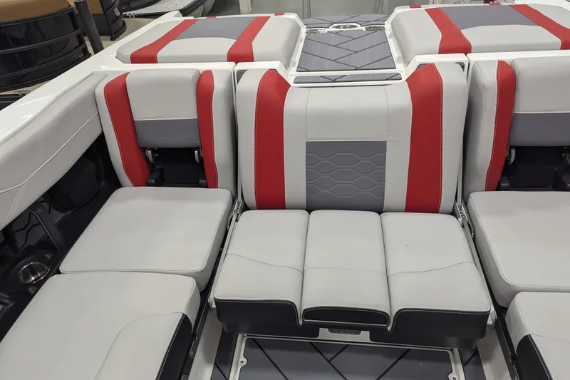 Slide: The Image of 2026 Malibu Wakesetter 23 LSV interior with red and gray seating design. - 15