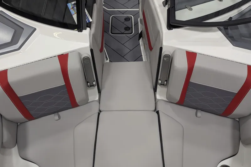 Slide: The Image of Interior of 2026 Malibu Wakesetter 23 LSV boat with gray and red seating. - 18