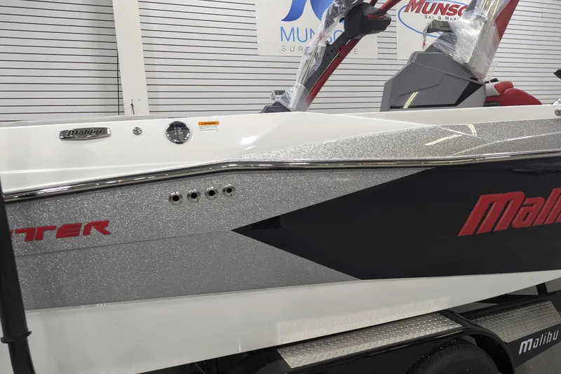 Slide: The Image of 2026 Malibu Wakesetter 23 LSV boat with sleek design and modern features. - 4