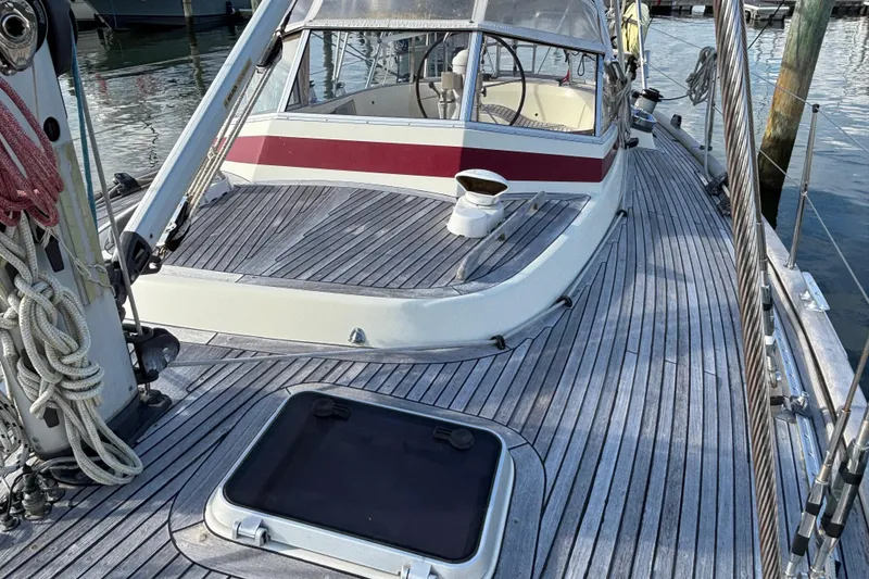 Slide: The Image of 1992 Najad 390 sailboat deck with wooden finish and cockpit view. - 10