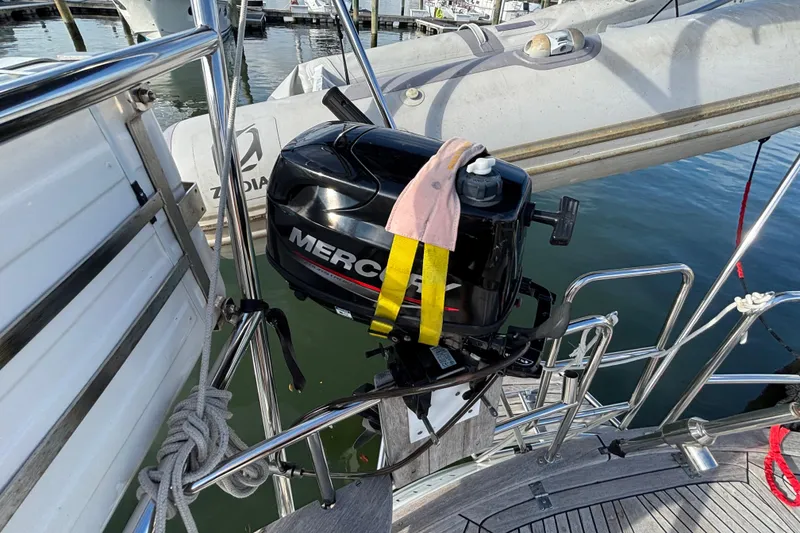 Slide: The Image of Outboard motor on 1992 Najad 390 sailboat, docked at marina. - 15