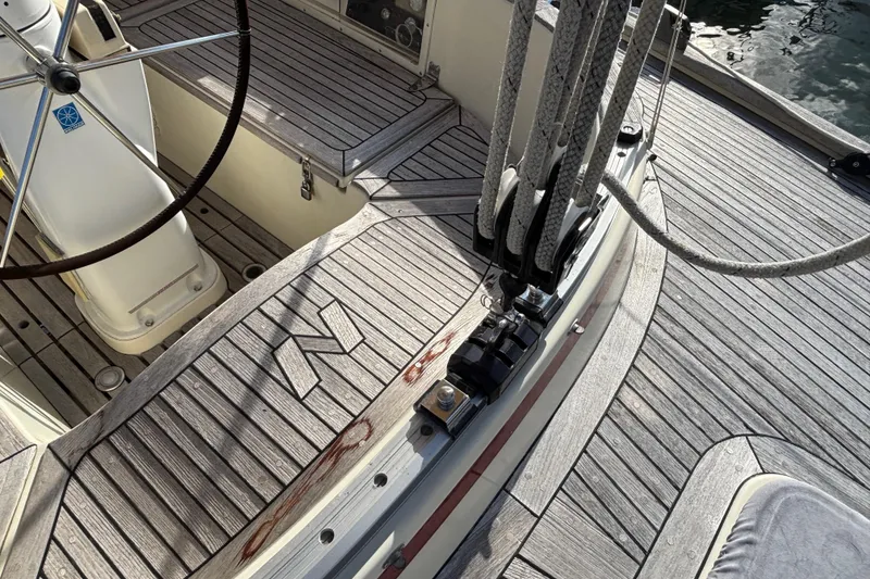 Slide: The Image of Cockpit of 1992 Najad 390 sailboat with wooden deck and steering wheel. - 19