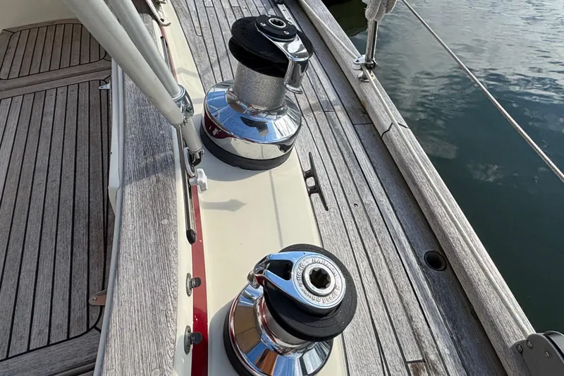 Slide: The Image of Deck of 1992 Najad 390 sailboat with winches and teak wood finish. - 21