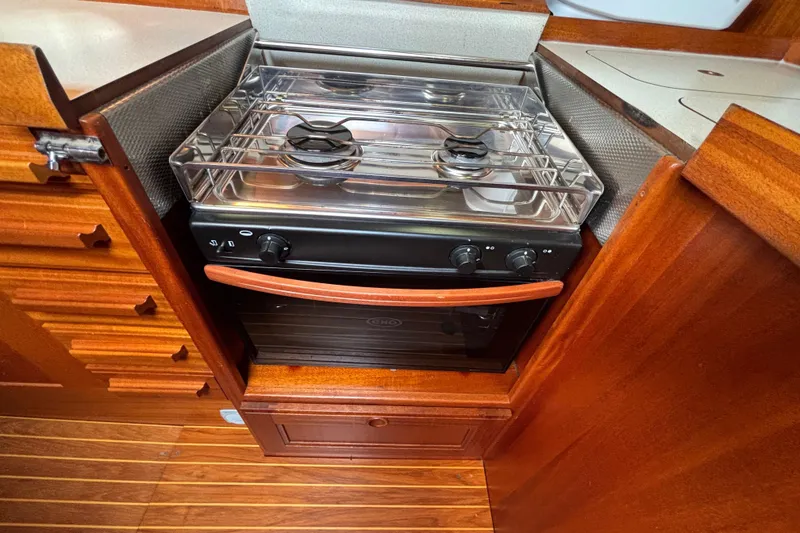 Slide: The Image of Wooden interior kitchen with stove in 1992 Najad 390 yacht. - 43