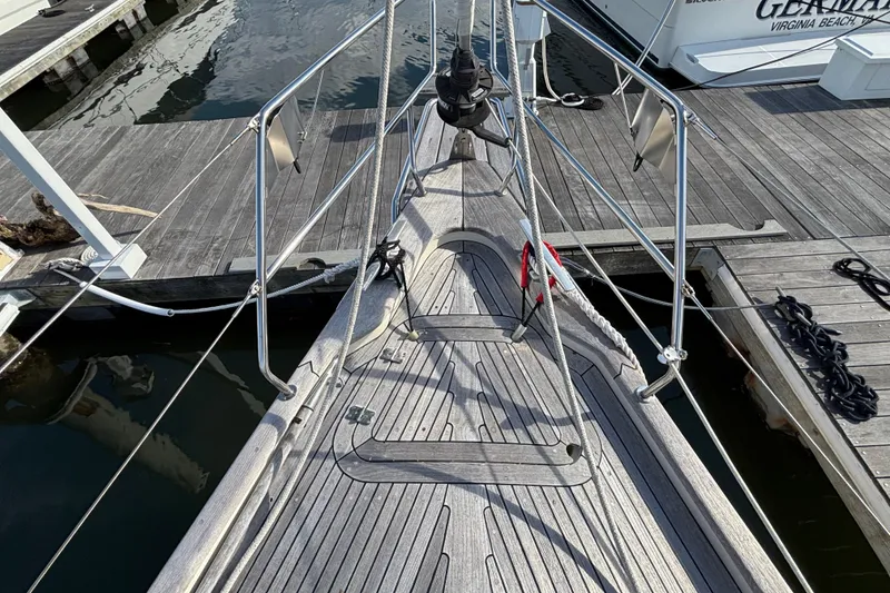 Slide: The Image of Deck of a 1992 Najad 390 sailboat docked at a marina. - 5