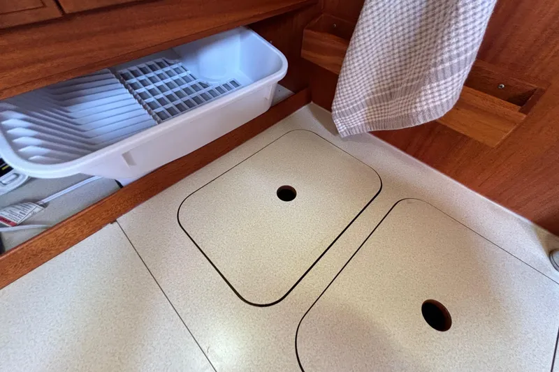 Slide: The Image of Interior of 1992 Najad 390 yacht showing kitchen storage and countertop. - 51