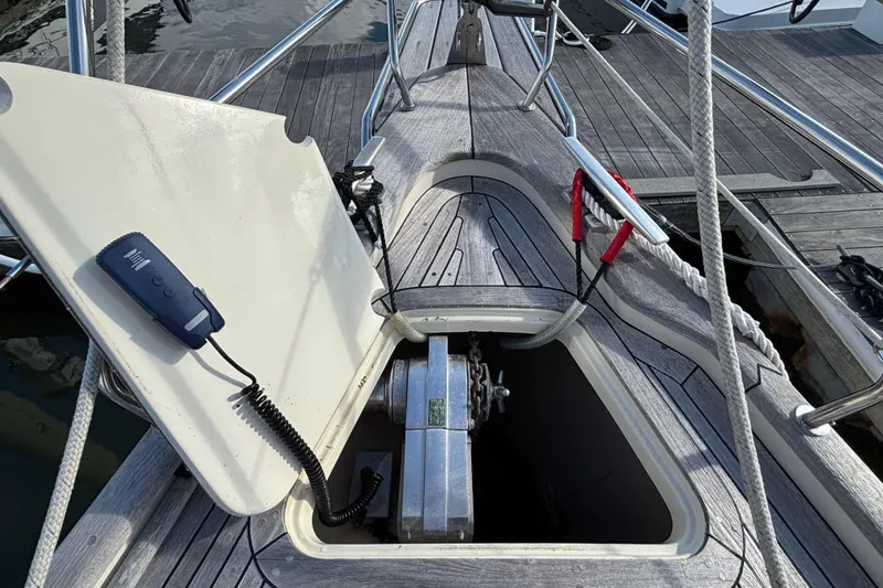 Slide: The Image of Deck of 1992 Najad 390 sailboat with open hatch and winch controls. - 6
