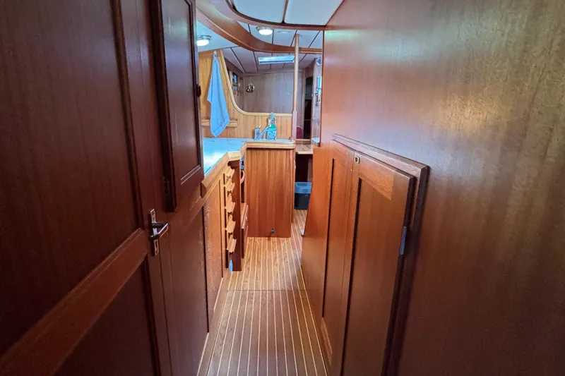 Slide: The Image of Interior of 1992 Najad 390 yacht with wooden cabinetry and flooring. - 60