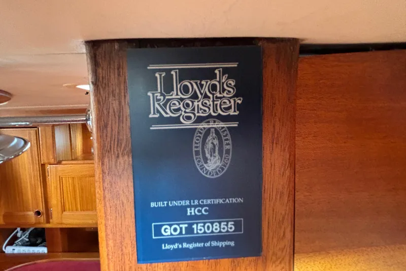 Slide: The Image of Plaque on 1992 Najad 390 yacht, Lloyd's Register certification, wooden interior detail. - 75