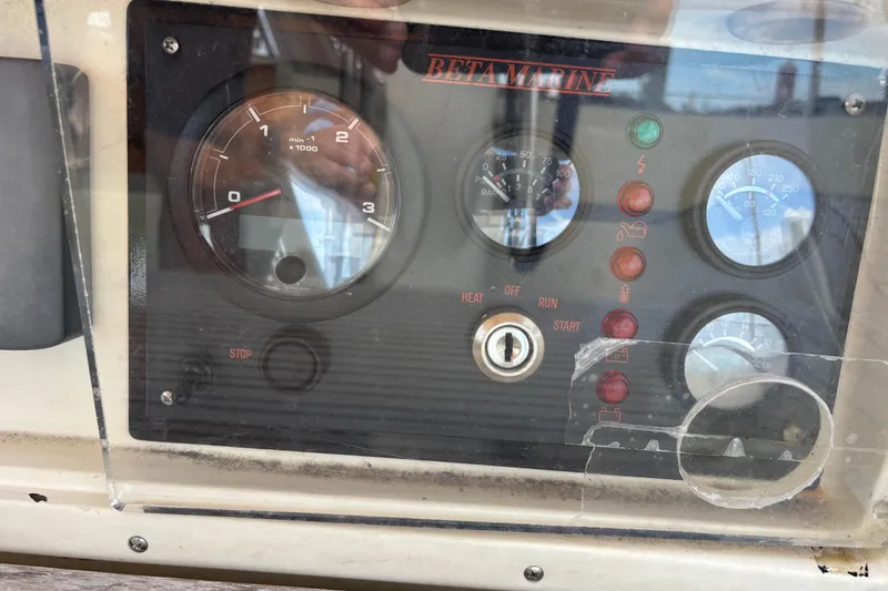 Slide: The Image of Control panel of a 1992 Najad 390 sailboat with Beta Marine engine gauges. - 79
