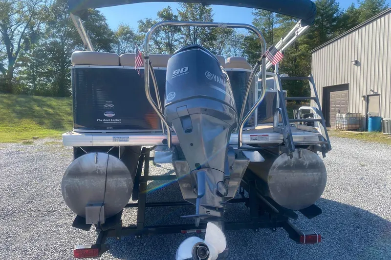 Slide: The Image of 2014 Godfrey SWEETWATER 2086 pontoon boat with Yamaha 90 engine, parked outdoors. - 1