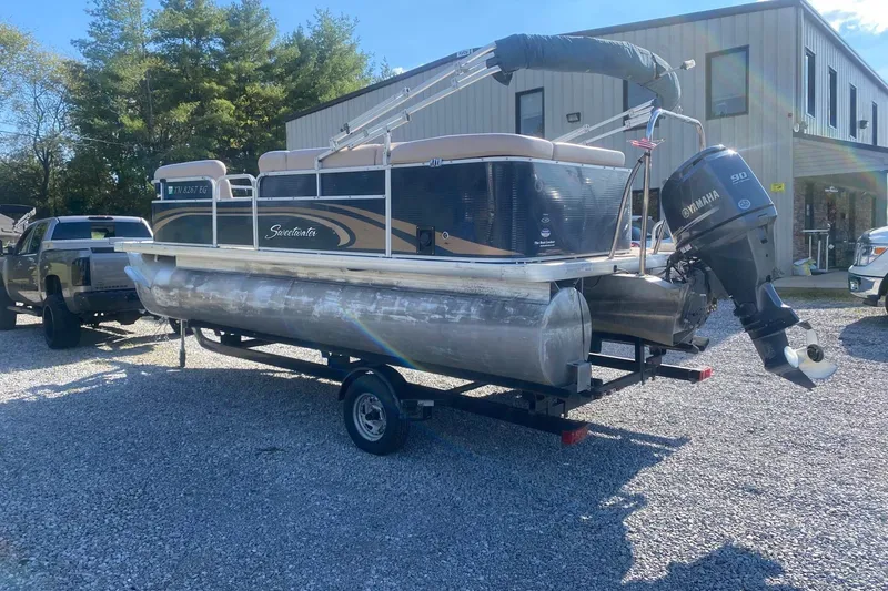 Slide: The Image of 2014 Godfrey SWEETWATER 2086 pontoon boat on trailer, with Yamaha outboard motor. - 2