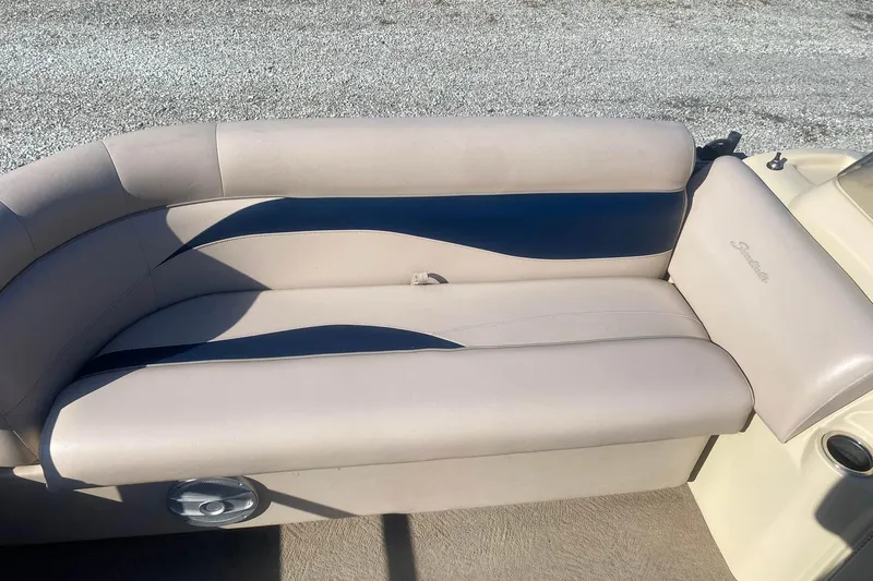 Slide: The Image of 2014 Godfrey SWEETWATER 2086 boat seating with beige and blue upholstery. - 5
