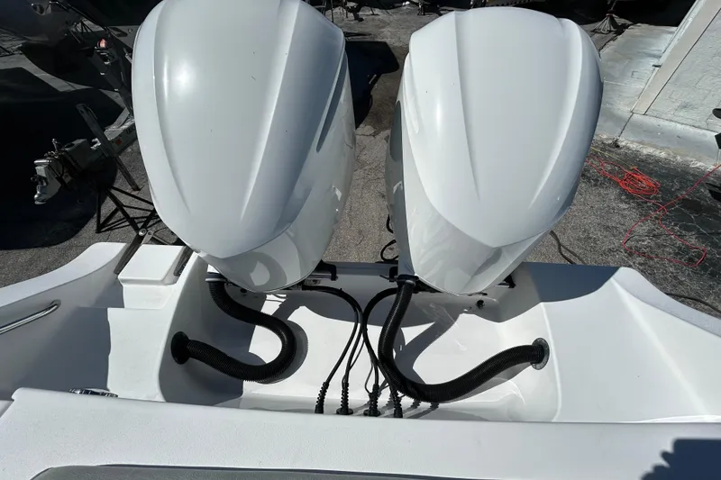 Slide: The Image of 2019 Sportsman Open 282 Center Console with dual outboard engines, viewed from above. - 27
